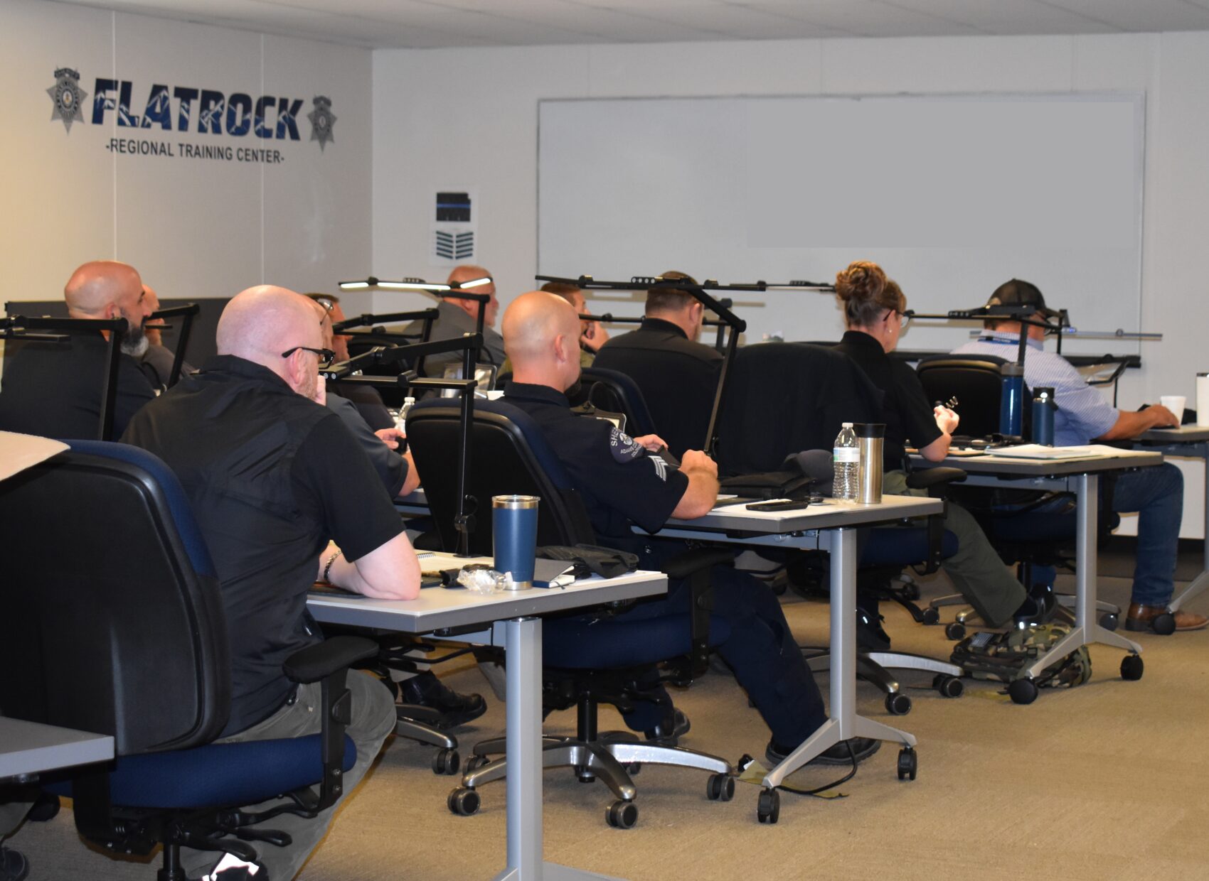 Classroom at Flatrock Regional Training Center with people concentrating at desks